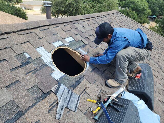 Removing shingles around the area.