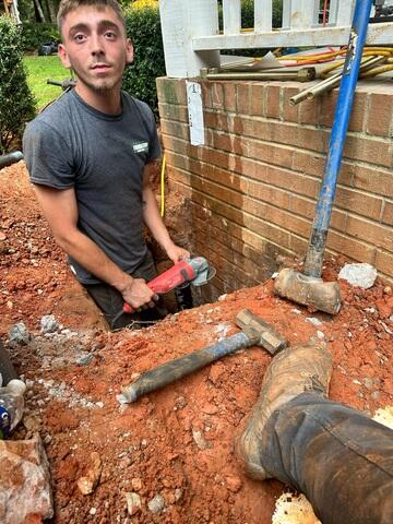 Crew Installing Foundation Piers