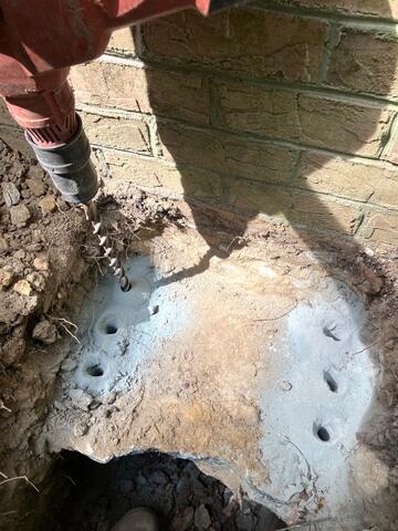 Removing Soil For Pier Installation