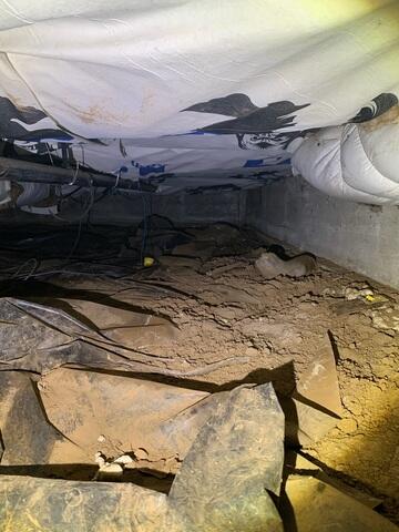 Old Vapor Barrier in Poor Condition
