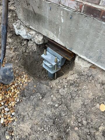 Complete Helical Pier Installation