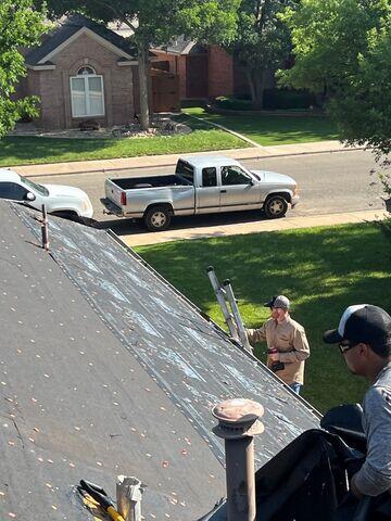 Crew members and Project manager working on the