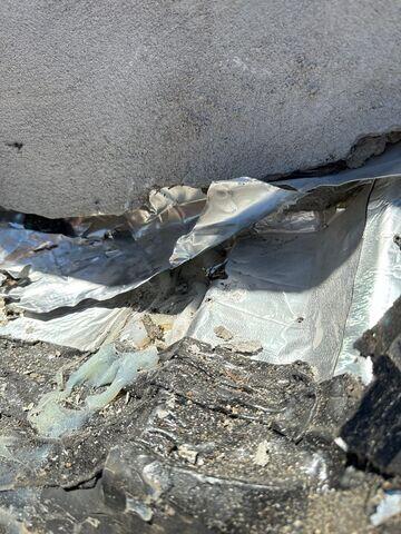 Damaged Metal Shingles