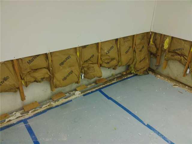 Damaged sheetrock removed from basement