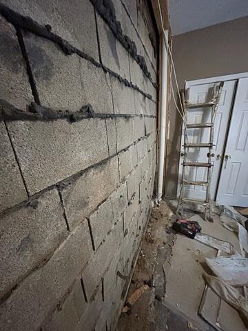 Bowing and Buckling Wall