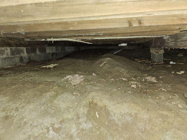 Unfinished Crawl Space with Exposed Dirt - Appleton, ME