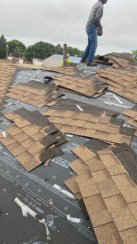 Removing the shingles.