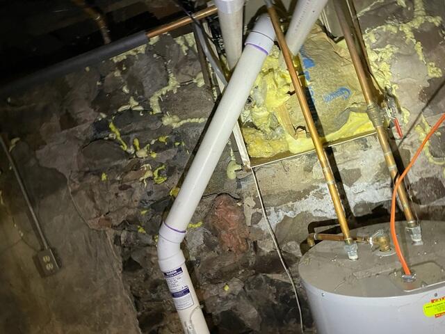 Previouse Insulation Behind Pipes