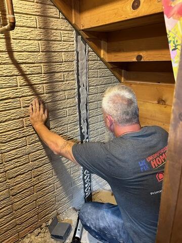 Flexible Sealant, Foam-Lined Channel and Impermeable Membrane Installed