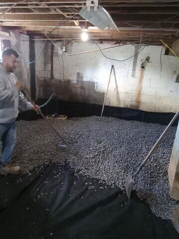 Add gravel drainage bed