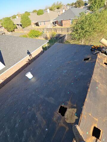 Shingles remove and decking exposed.