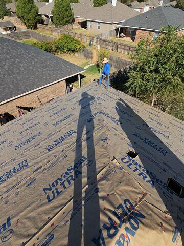 Underlayment being placed.