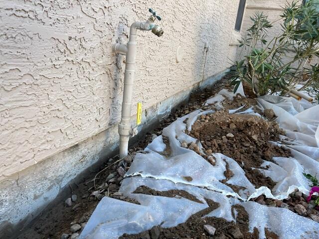 Stem Wall Repair: Using plastic sheeting to protect the surrounding area in Scottsdale, AZ
