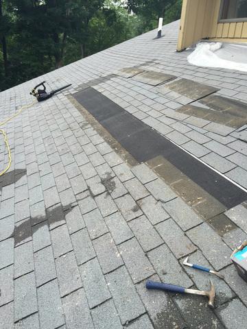 Blown-in insulation is the perfect solution to add important R-value to the cathedral ceiling in this home.  We started by removing two rows of shingles and cutting back a small section of roof sheathing.