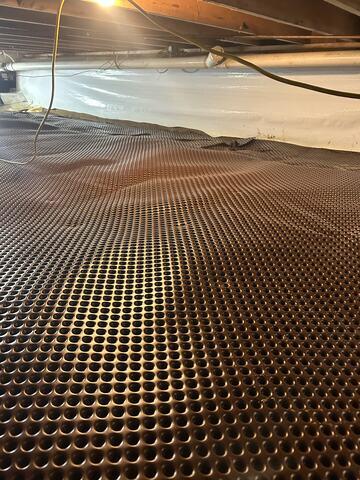 Removal of Water From the Drainage Matting