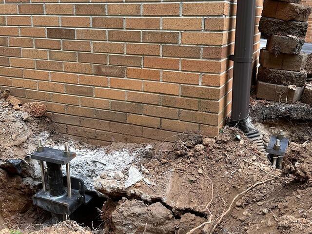 A photo of the house corner, finally stabilized.