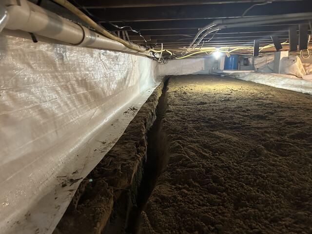Regraded Ground and New Trench