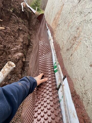 Putting in Cavity Drain Membrane