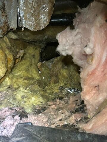 Mess of Old Insulation