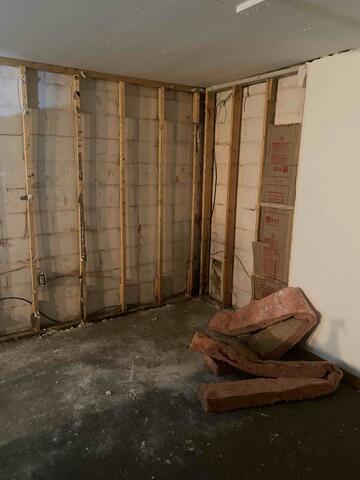 Behind the Dry Wall