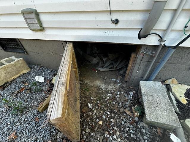 Inadequate Crawl Space Door