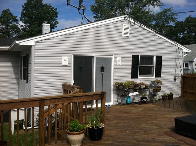 Roofing is Owens Corning Duration Shingle in color: Onyx

Siding was done in a 5 inch Dutch Lap in Sterling Gray with black shutters,

Gutters are: 5" White Aluminum Seamless gutters with 2x3 Leaders
