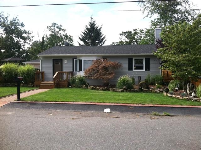 Roofing is Owens Corning Duration Shingle in color: Onyx

Siding was done in a 5 inch Dutch Lap in Sterling Gray with black shutters,

Gutters are: 5" White Aluminum Seamless gutters with 2x3 Leaders
