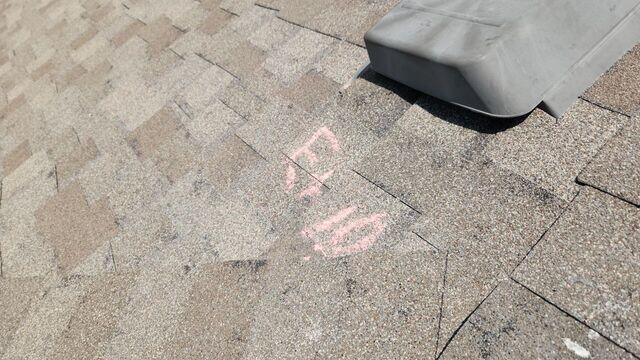 Hail hits marked by Re- Roof Specialist