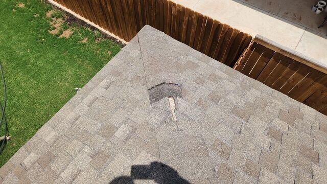 Missing Shingles on the roof.