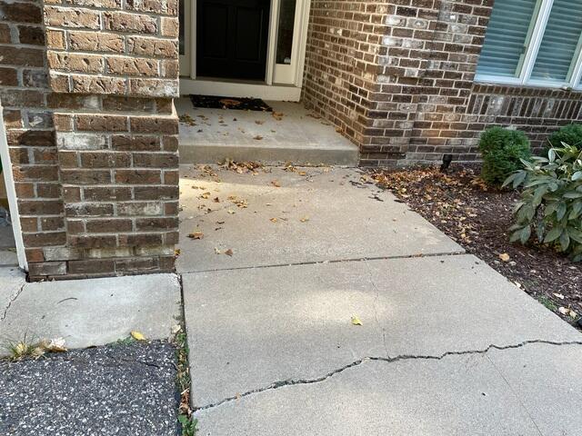 Cracked and Uneven Sidewalk