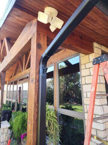 Gutter downspout installed