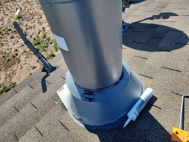 Resealing flashing on vent of Kitchen.