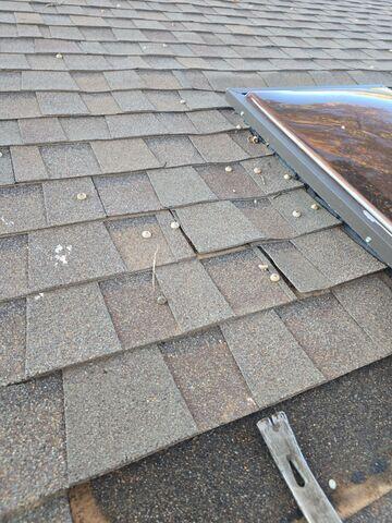 Removing the shingles.