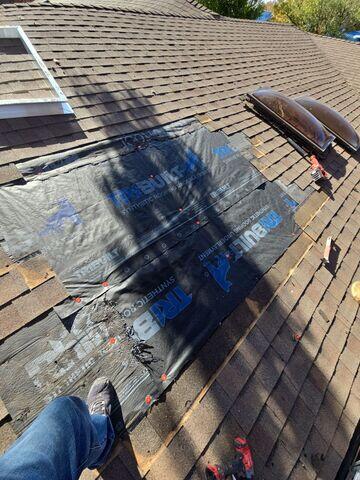 Removing the shingles and Skylight.