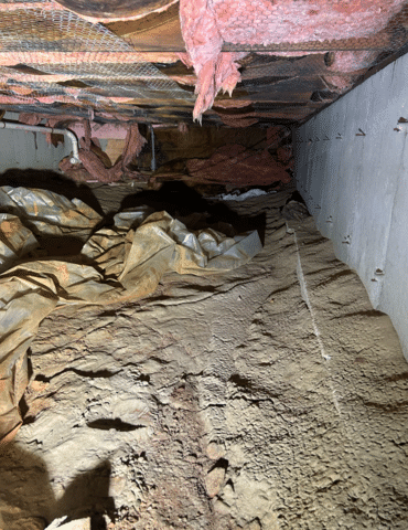 Plastic, dirt, and tired, damp insulation.
