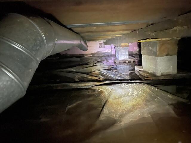 Before Photo of Uninsulated Crawlspace