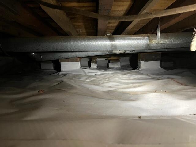 After Photo of Clean, Insulated Crawlspace