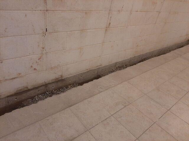 Trench Dug and Weep Holes Drilled