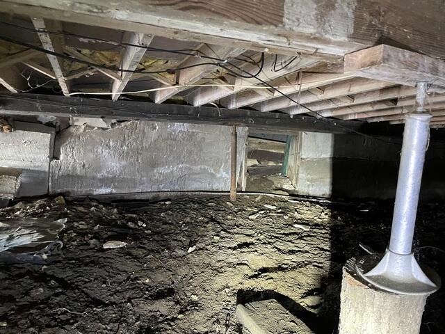 Before: Foundation Wall and Beam in Critical Condition