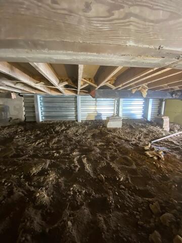 After: Foundation Wall and Beams Fully Supported and Reinforced