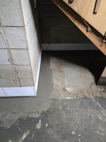 Wall Flange for Subfloor Drains