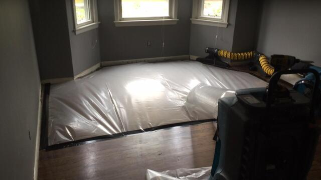 Encapsulation of Wet Hardwood Floors in New Milford, CT.