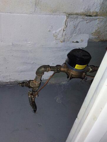 Water Damage and Corrosion in a Damp Basement