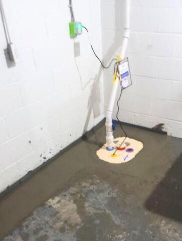 Basement Waterproofing System with Sump Pump Installed in Redford, Michigan