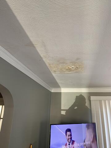 Roof Leak Travels to Living Room Ceiling in Meriden, CT