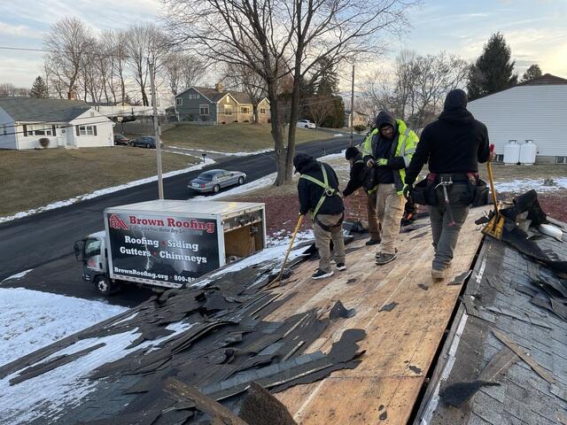 Shingle Removal Begins