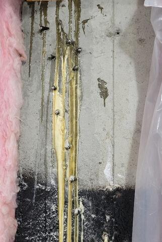 Material is injected to seal the crack