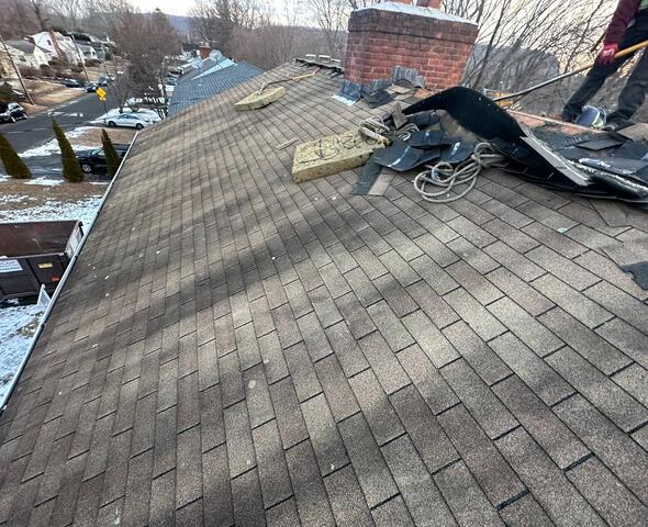 Roof Removal Begins