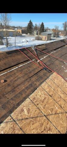 New OSB going on over the old 1 by boards