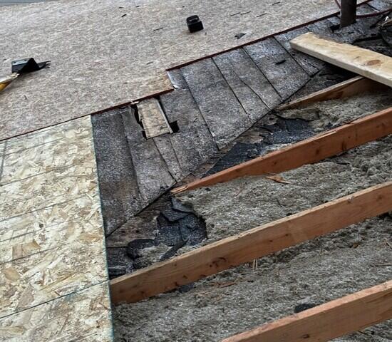 Replacing the old rotten decking with fresh OSB